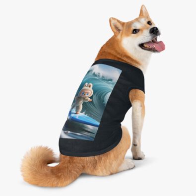 A playful dog wearing a surfing bunny tank top with a colorful surfboard design