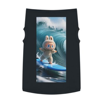 A playful dog wearing a surfing bunny tank top on a beach
