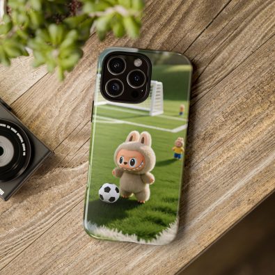A colorful phone case featuring a playful bunny holding a soccer ball, designed for kids and sports enthusiasts