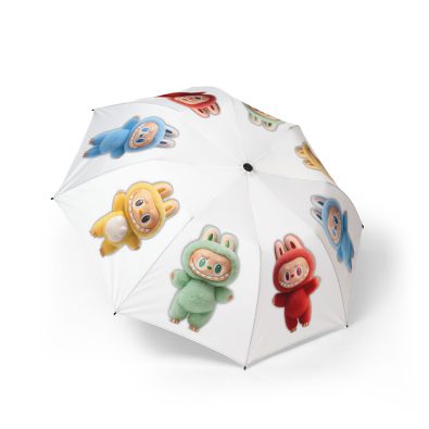 A colorful, foldable umbrella with a playful design, featuring a semi-automatic opening mechanism and a compact handle for easy carry.