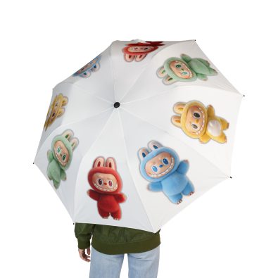 A bright pink and blue Labubu umbrella unfolding automatically in a gentle rain